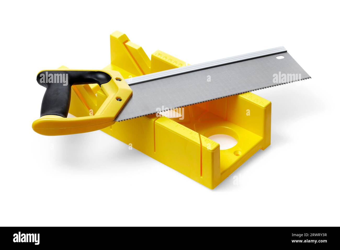 A yellow miter box and a backsaw on white Stock Photo
