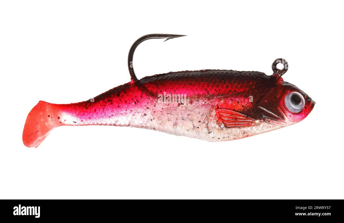 A red rubber fishing jig lure Stock Photo - Alamy