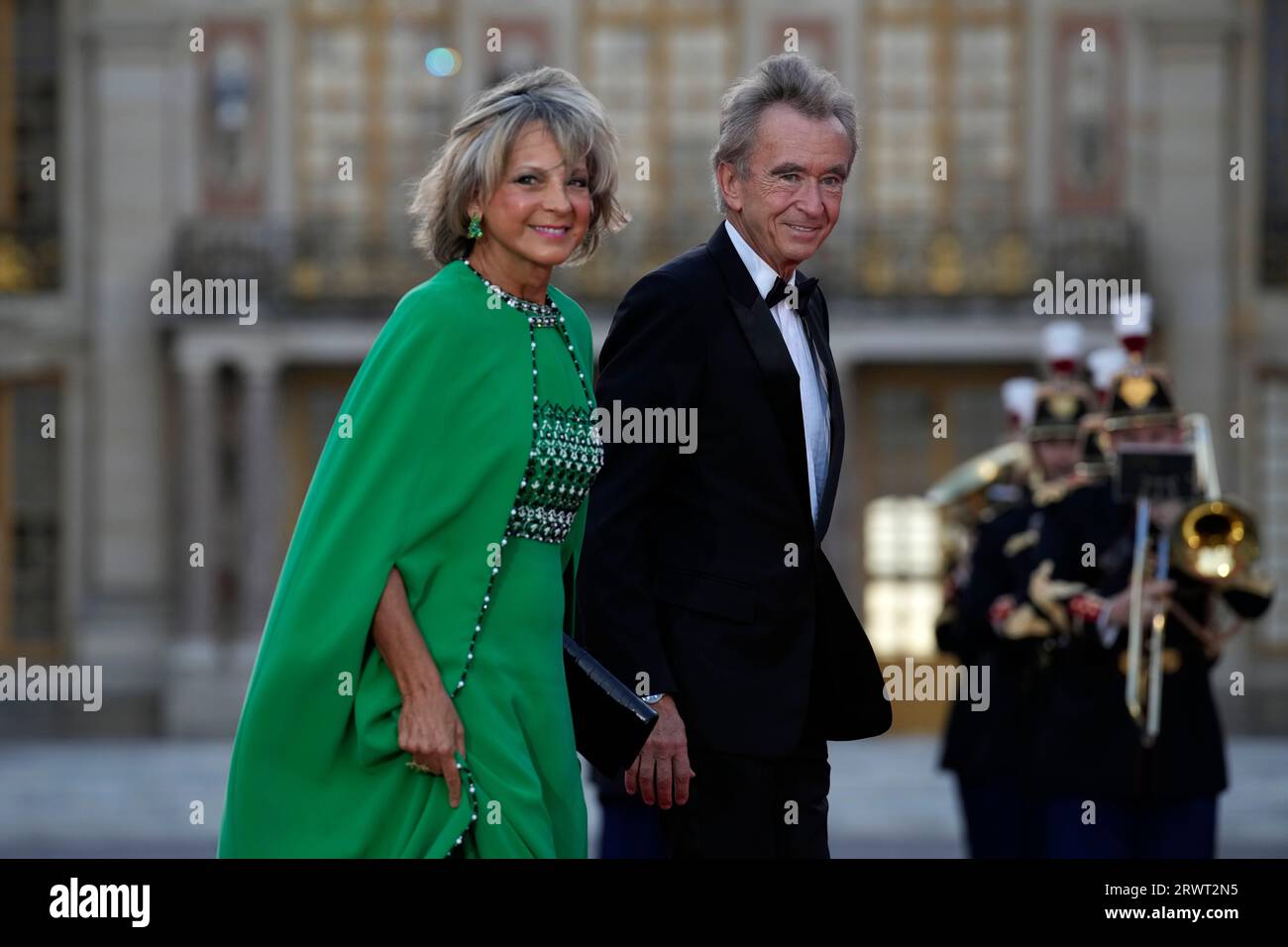 LVMH CEO Bernard Arnault and his wife Helene upon arrival to the cocktail  reception for the inauguration of the new Louis Vuitton house on the  Champs-Elysees in Paris, France, on October 9
