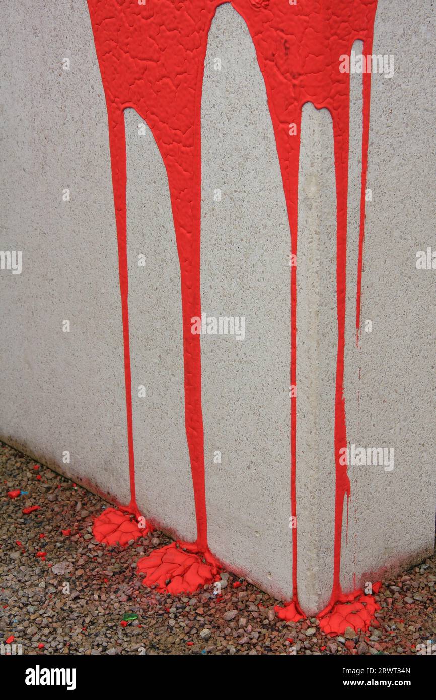 Red paint running down a concrete wall, formatfilling Stock Photo Alamy