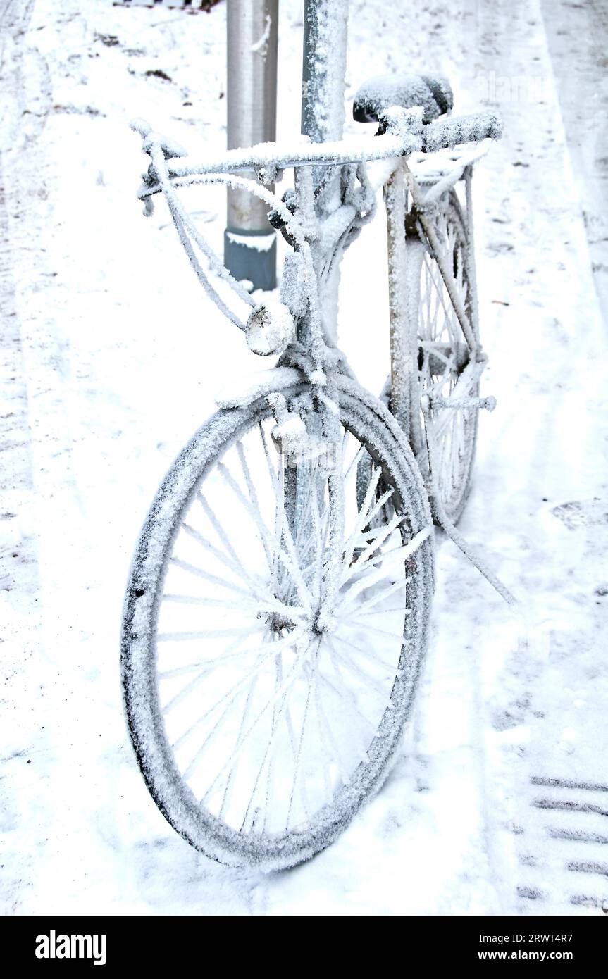 Snowed bike in winter Stock Photo Alamy