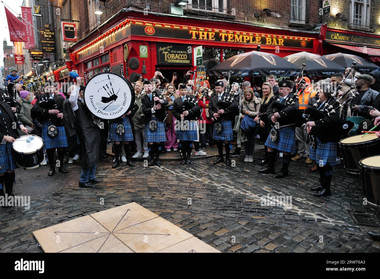 Members of the Clew Bay pipe band perform in Temple Bar during Tradfest, an Irish traditional music festival. Dublin, Ireland, Europe Stock Photo