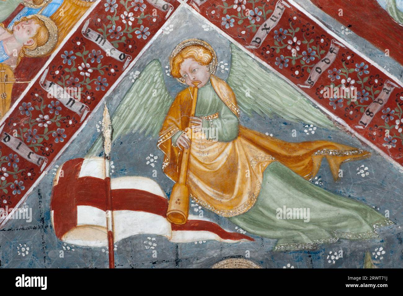 Ceiling fresco of an angel playing music by Maestro di Selva in the church of Santa Maria in Selva in Locarno Ceiling fresco of an angel playing Stock Photo