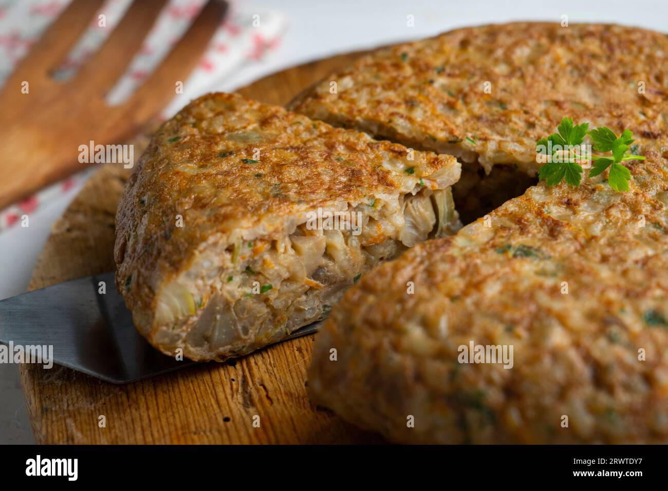 Spanish omelet made with rice and carrot and artichokes Stock Photo Alamy