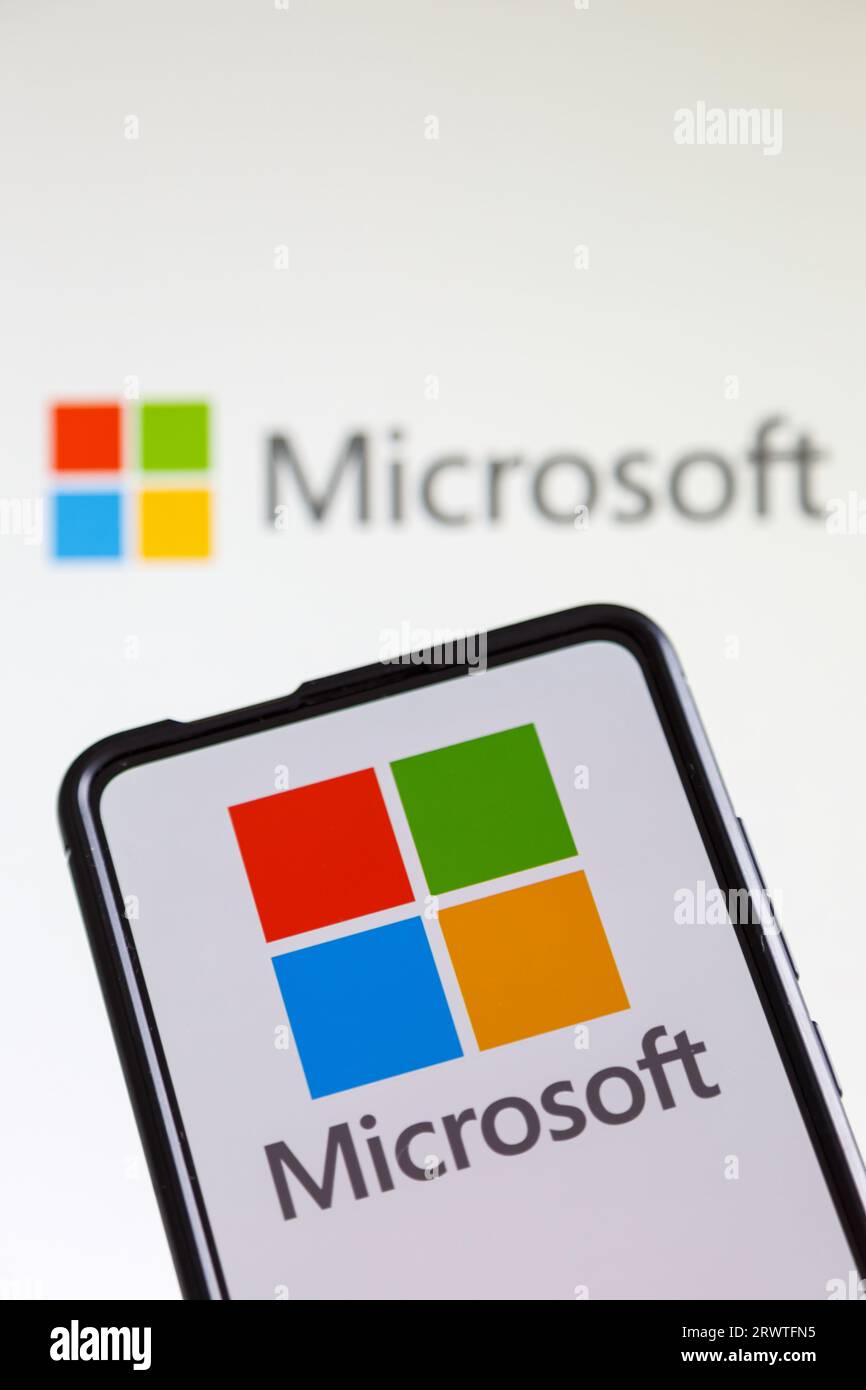 Stuttgart, Germany - July 20, 2023: Microsoft logo of the software company on a mobile phone and computer screen in Stuttgart, Germany. Stock Photo