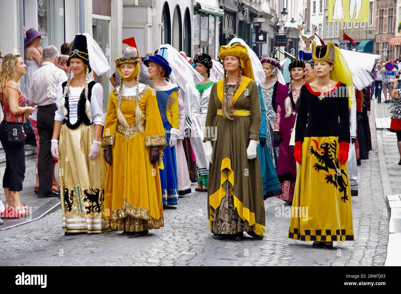 Marchers in The Procession of the Golden Tree Pageant, held every 5 years since 1958. Bruges, Belgium. Stock Photo