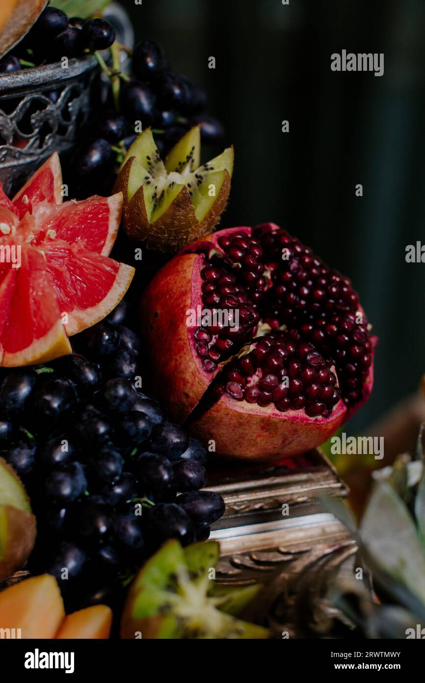 A variety of fresh fruits arranged neatly on a tabletop. Stock Photo