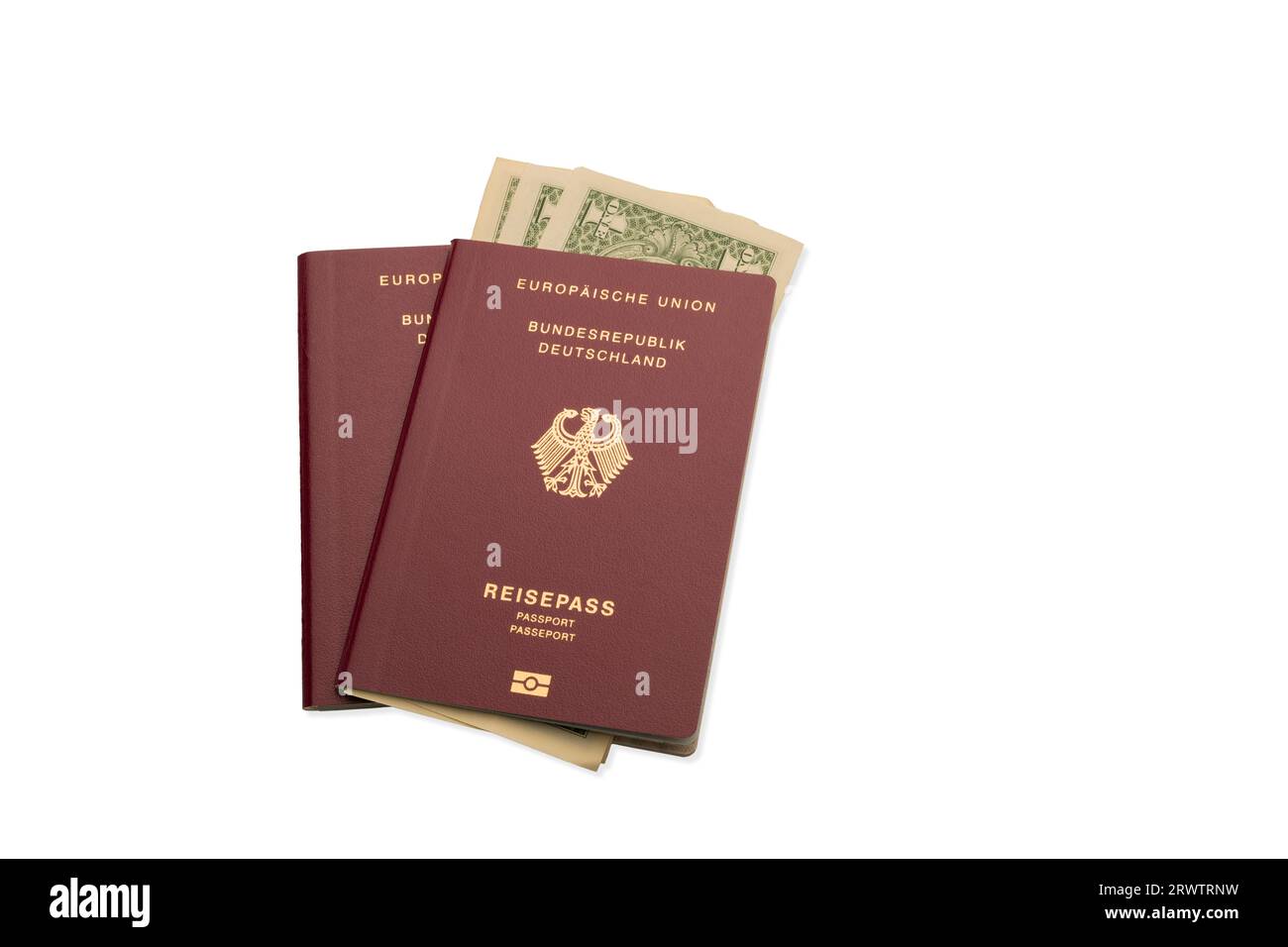 , Symbole, Deutschland, 21.09.2023,  Auf dem Bild sind zwei deutsche Reisepässe vor einem weißen Hintergrund abgebildet, in einem von ihnen stecken US Stock Photo