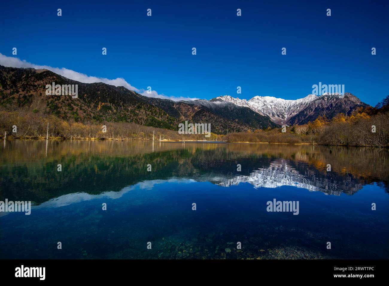 Taisho Pond reflecting the Hotaka mountain range Stock Photo