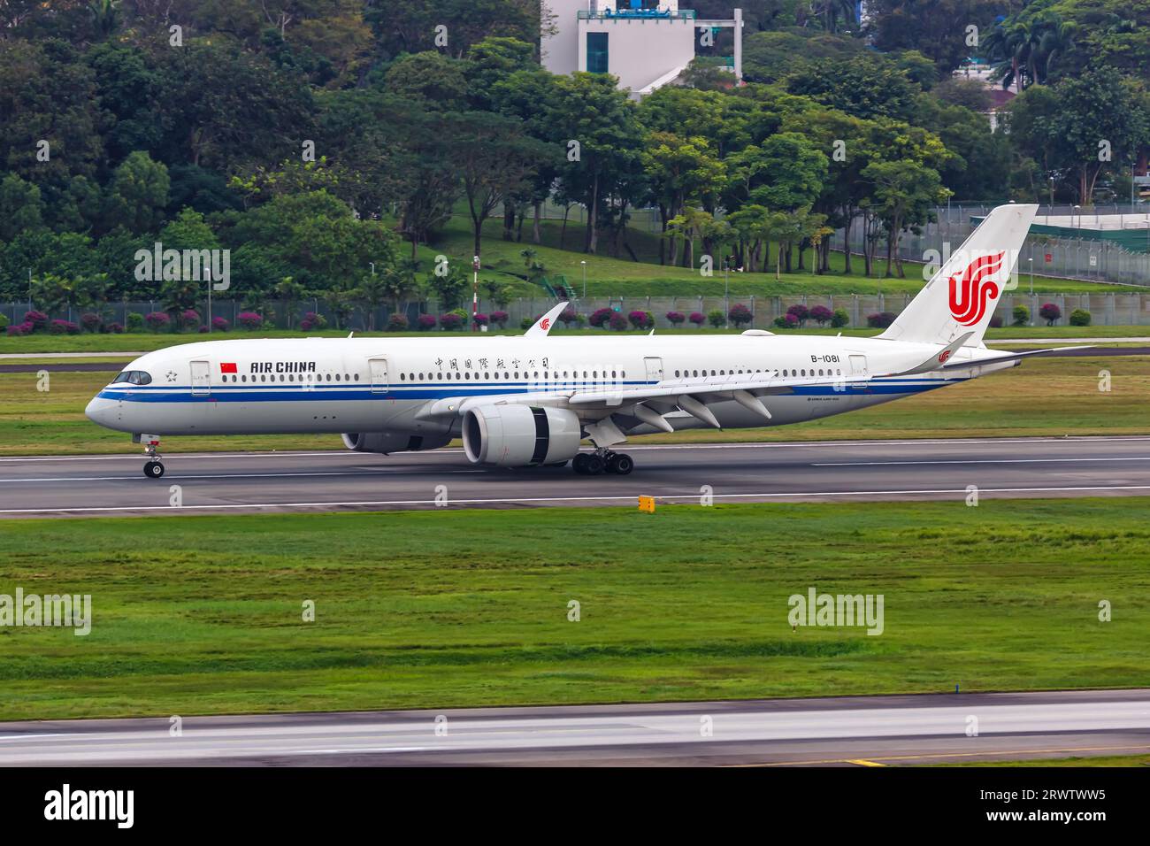 Changi, Singapore - February 3, 2023: Air China Airbus A350-900 airplane at Changi Airport in Singapore. Stock Photo