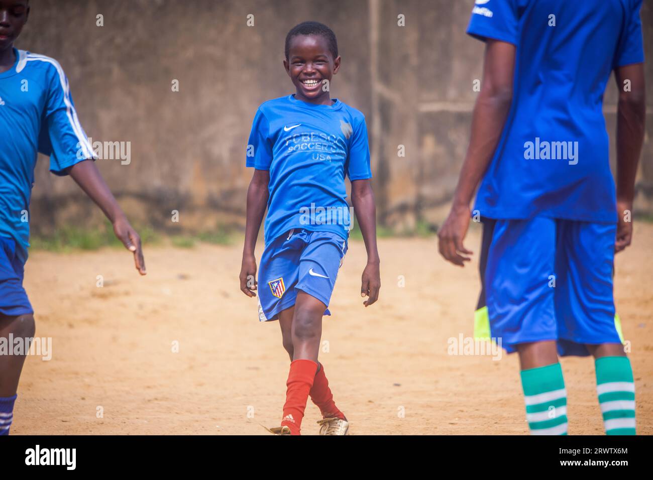 LAGOS, NIGERIA SEPTEMBER 15 School boys playing soccer at Ansarudeen