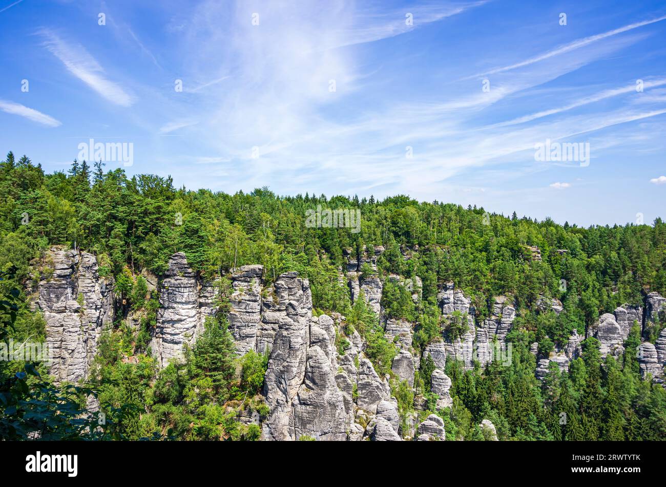 Picturesque view of the rocky outcrops of the Elbe Sandstone Mountains in the Bastei rock formation area, Saxon Switzerland, Saxony, Germany. Stock Photo