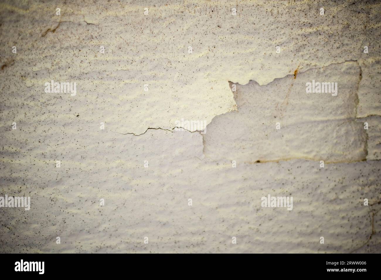 Wall with cracks and cracked paint Stock Photo