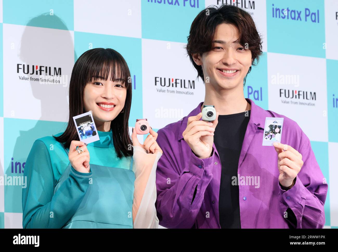 Tokyo, Japan. 21st Sep, 2023. Japanese actor Ryusei Yokohama (R) and actress Suzu Hirose (L) attend a promotional event of Fujifilm's new tiny digital camera 'Instax Pal' which enables to connect with smart phone or instant photo printer in Tokyo on Thursday, September 21, 2023. The Instax Pal which has a wide angle lens equibalent to 16mm in 35mm camera will go on sale on October 5. (photo by Yoshio Tsunoda/AFLO) Stock Photo
