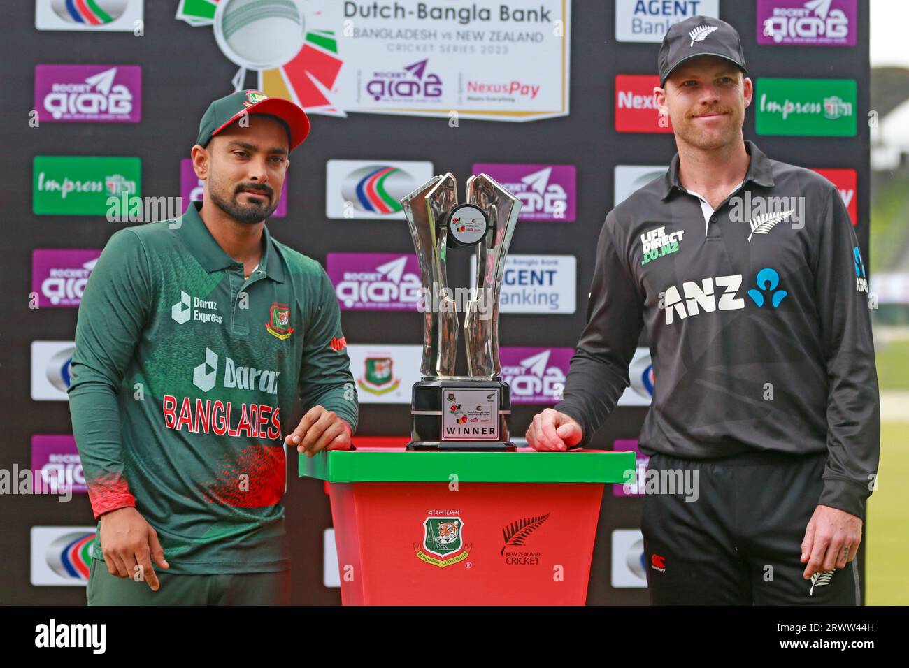 Liton Das (L) Bangladesh Team Captain and Lockie Ferguson (R) New Zealand ODI Team Captain unveil the three One Day International match series in Dhak Stock Photo