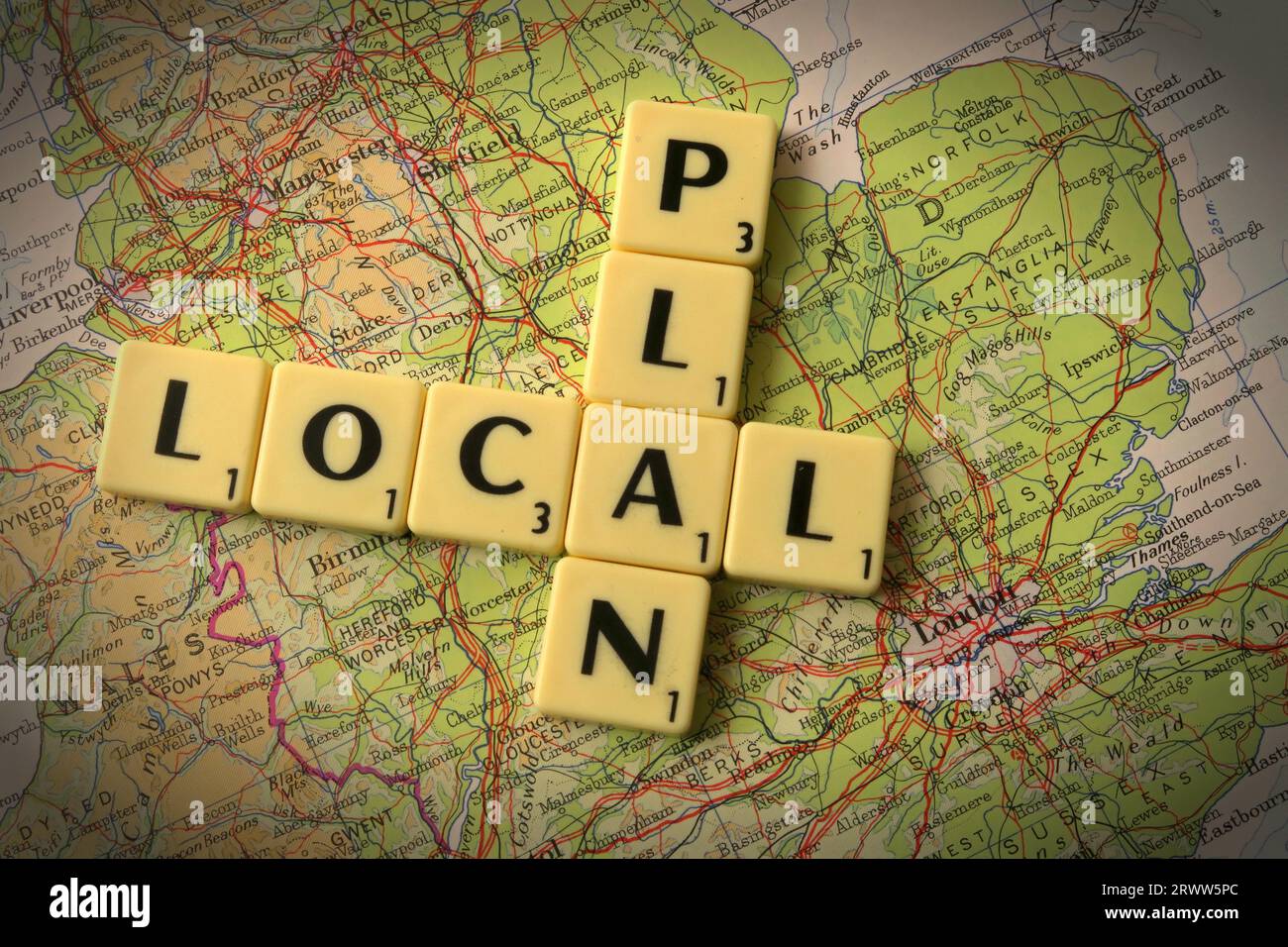 Local Plan spelled out in Scrabble letters and words on a map of England - local development and building control Stock Photo