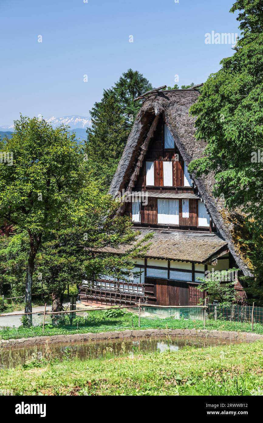 The former Nishioka House in the village of Hida with a view of the ...