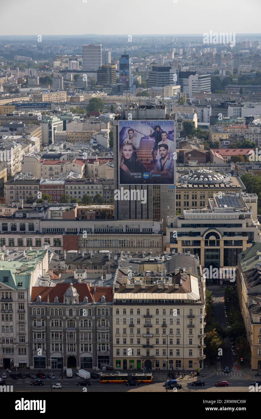 view of Warsaw city center, Poland, with large advertisement for Top Model tv show on billboard. Stock Photo