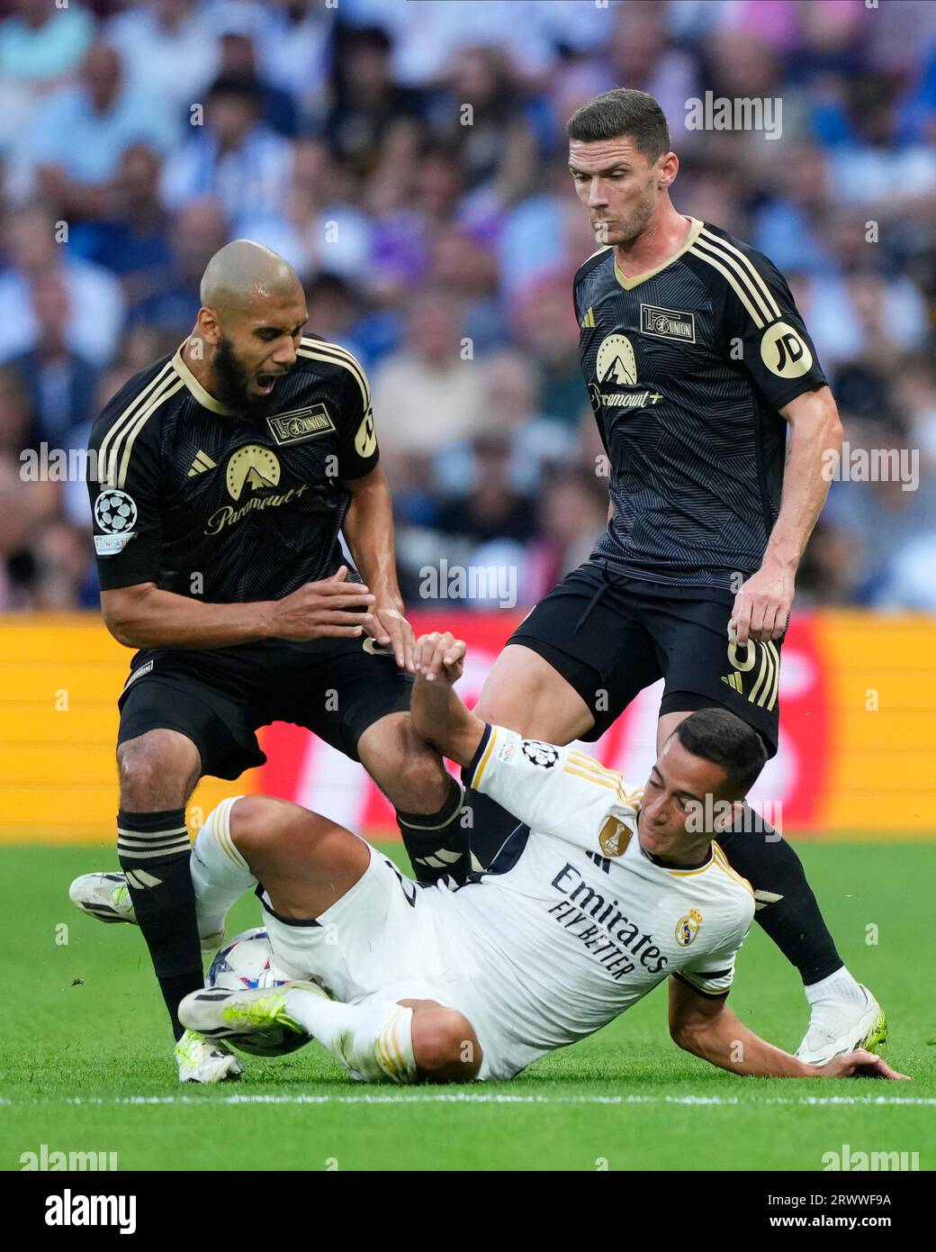 Madrid, Spain. 20th Sep, 2023. Lucas Vazquez of Real Madrid CF and Aissa Laidouni and Robin Gosens of FC Union Berlin during the UEFA Champions League match, Group C, between Real Madrid and Union Berlin played at Santiago Bernabeu Stadium on September 20, 2023 in Madrid, Spain. (Photo by Cesar Cebolla/PRESSINPHOTO) Credit: PRESSINPHOTO SPORTS AGENCY/Alamy Live News Stock Photo