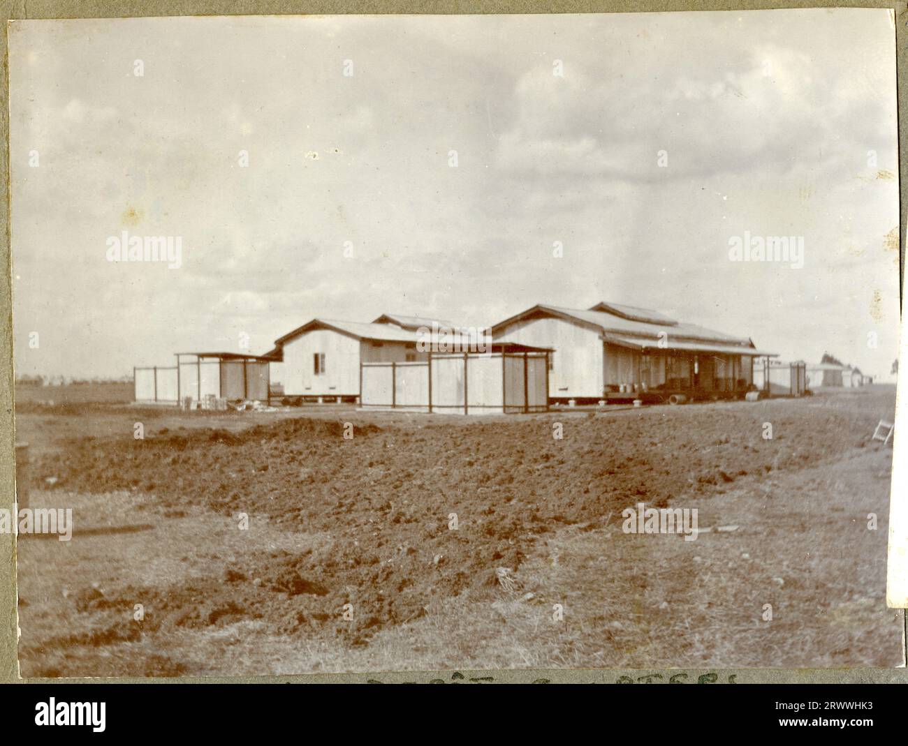 Exterior view of one of Charles and May Bungeys' Nairobi homes, seen from across the garden. The caption to another copy states that the house burnt down in 1922. Stock Photo