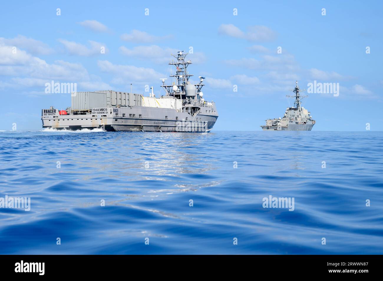 Pacific Ocean, United States. 15 September, 2023. The U.S Navy unmanned surface vessel USV Ranger, left, follows the Arleigh Burke-class guided-missile destroyer USS Shoup in formation during Integrated Battle Problem 23.2, September 16, 2023 on the Pacific Ocean. The Pacific Fleet exercise is to test, develop and evaluate the integration of unmanned platforms into fleet operations.  Credit: MC2 Jesse Monford/US Army/Alamy Live News Stock Photo