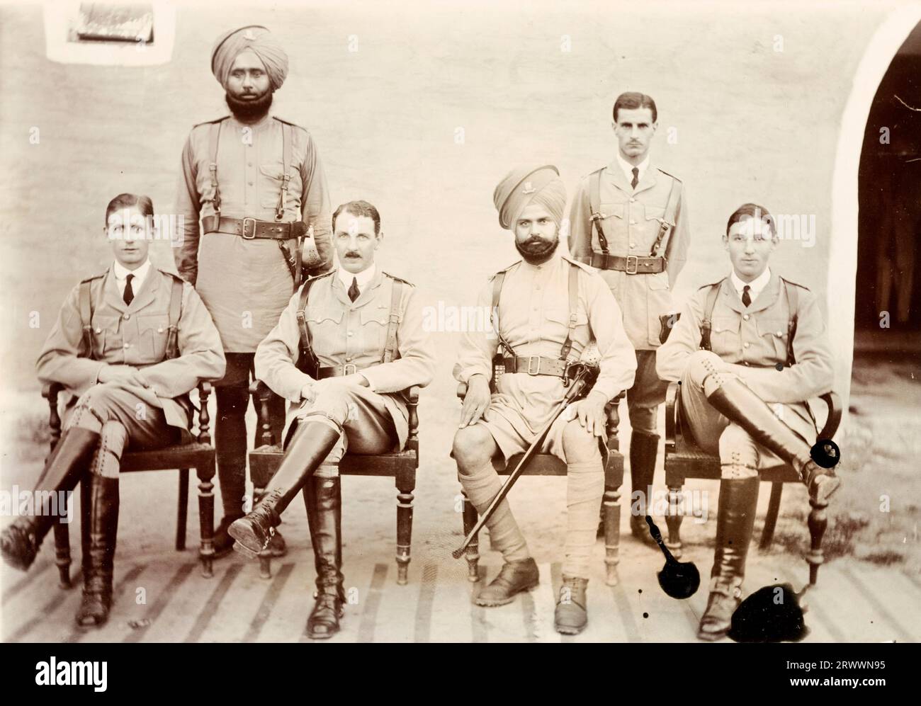 Six VCOs (Viceroy's Commissioned Officers) of the Indian Army pose for a group portrait dressed in military uniform in Multan, Punjab, where Winthrop was posted directly after receiving his commission.   Original manuscript caption: MULTAN 1916 H.E.W.  Jem Gujian Singh M.W. Sub Naram Singh  C.A. Keatings G.D.P. Stock Photo