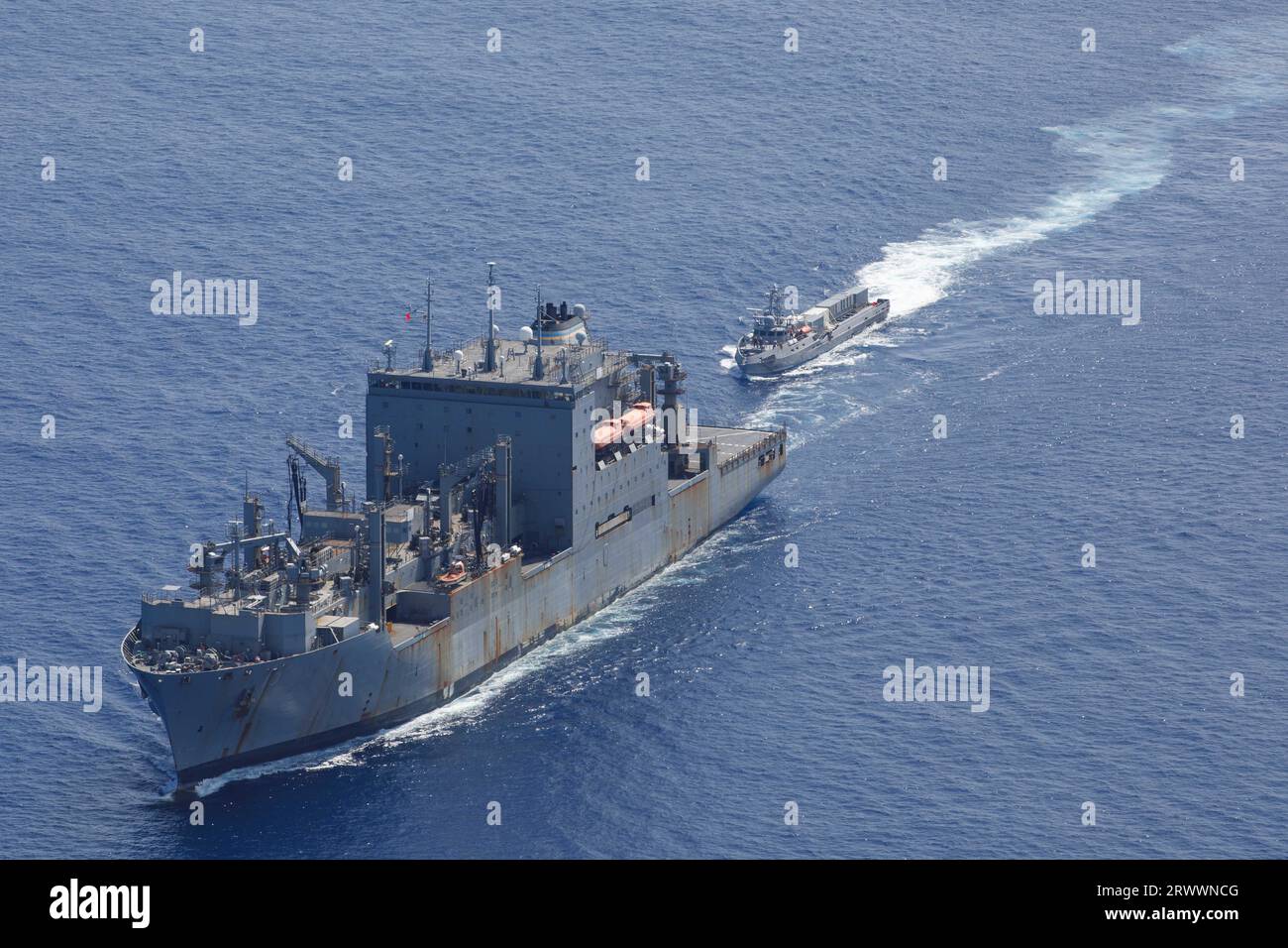 Pacific Ocean, United States. 16 September, 2023. The U.S Navy unmanned surface vessel USV Ranger, right, approaches for replenishment-at-sea with the Lewis and Clark-class dry cargo and ammunition ship USNS Charles Drew during Integrated Battle Problem 23.2, September 16, 2023 on the Pacific Ocean. The Pacific Fleet exercise is to test, develop and evaluate the integration of unmanned platforms into fleet operations.  Credit: MC2 Jesse Monford/US Army/Alamy Live News Stock Photo