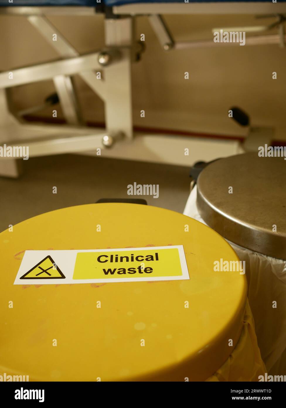 Clinical waste bin in a Doctor's examination room. Stock Photo