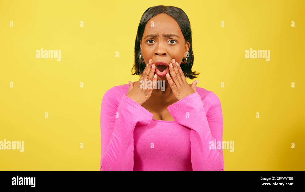 Shocked upset young woman puts hi-res stock photography and images - Alamy
