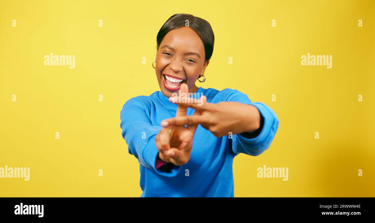 Beautiful Black woman dancing with hashtag symbol, social media campaign yellow Stock Photo Alamy