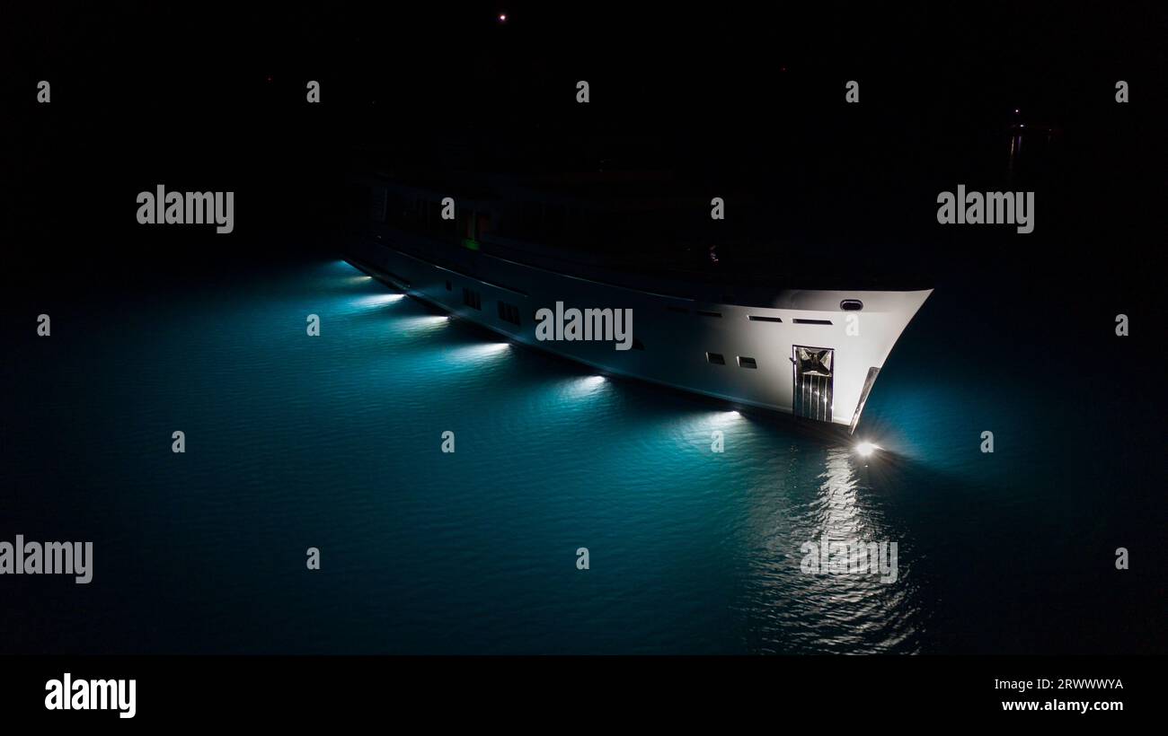 Luxury motor yacht, stunning submarine underwater lights illuminating