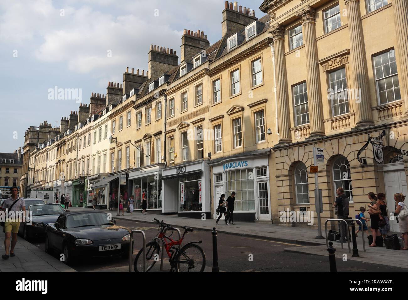 View along Milsom Street in the centre of Bath city centre England UK Georgian achitecture properties Stock Photo
