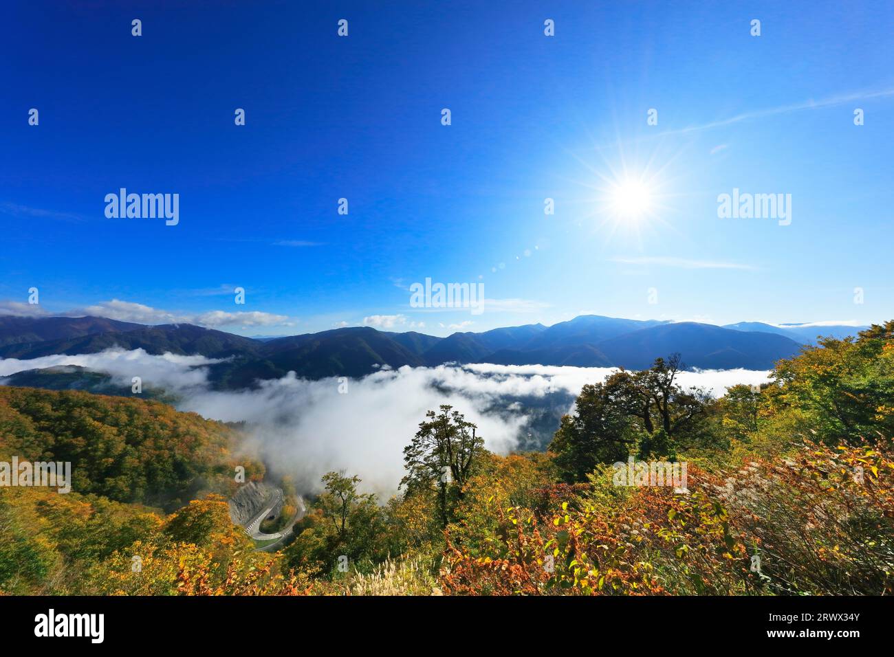 Sea of clouds and sun in the sky from White Road, Hakusan Shirakawa-go in Autumn Stock Photo