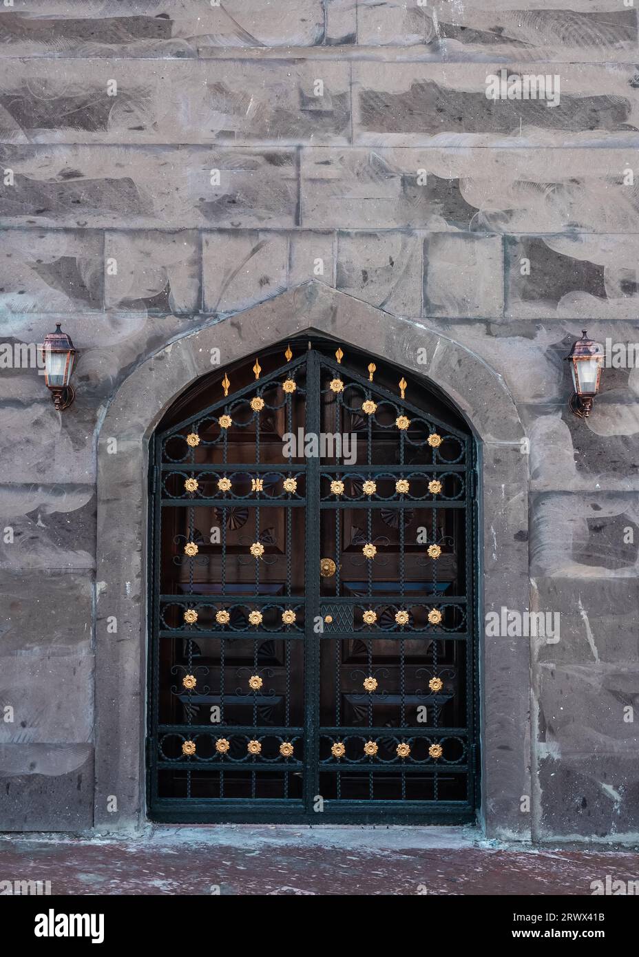 An iron door made with medieval architecture Stock Photo - Alamy
