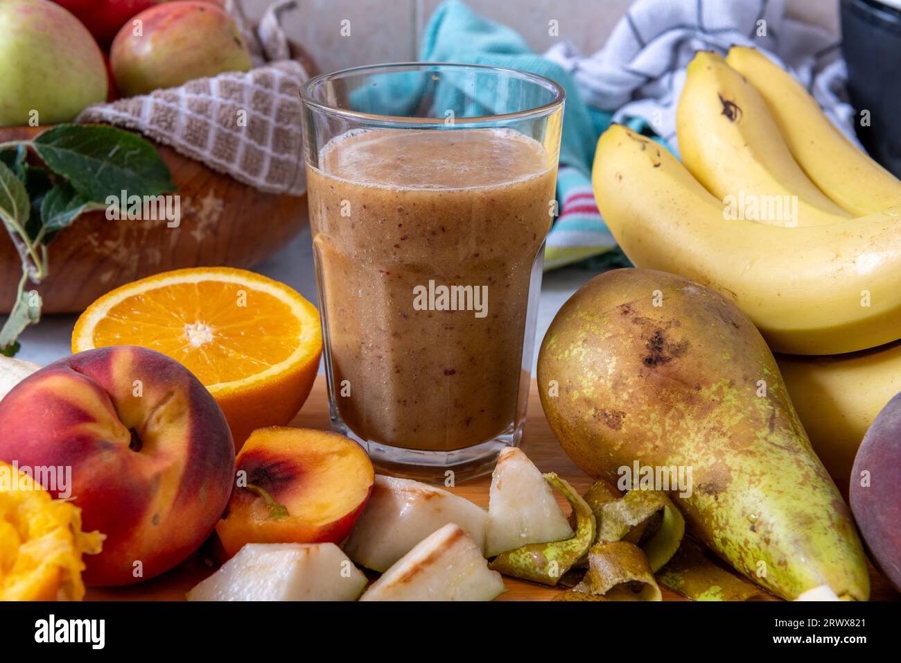 A glass of smoothie made with fresh fruits. Healthy living, lifestyle concept. Stock Photo