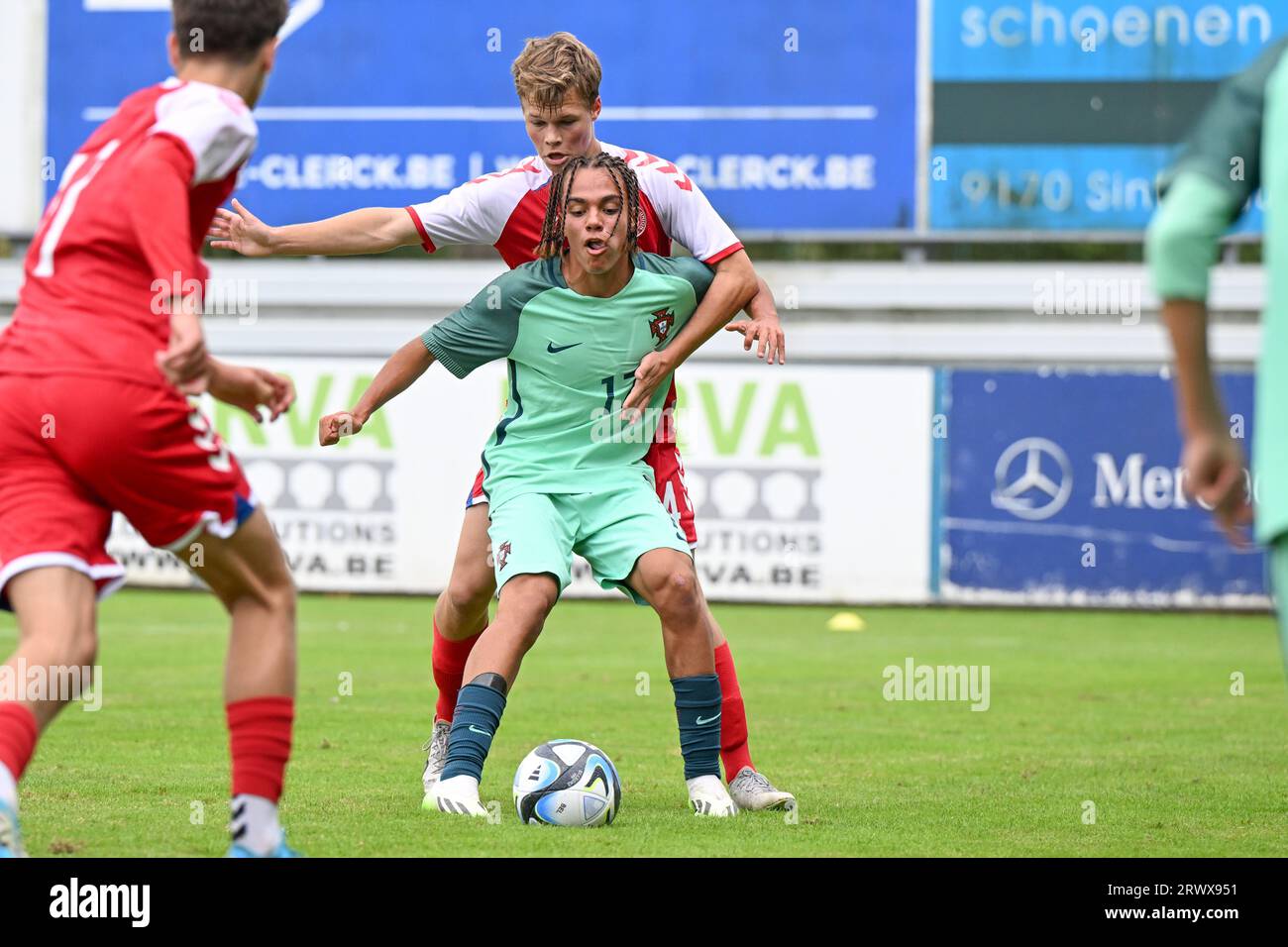 Lucas Bryde Bolvinkel (14) of Denmark pictured defending on Ricardo  Fernandes (17) of Portugal during a friendly soccer game between the  national under 16 teams of Denmark and Portugal on Tuesday 19