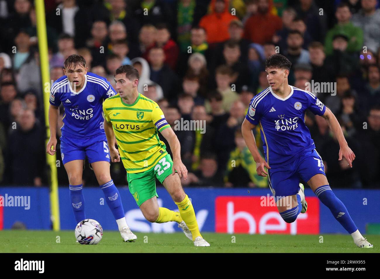 Kenny McLean of Norwich City in action with Cesare Casadei (R) and Callum Doyle (L) of Leicester City- Norwich City v Leicester City, Sky Bet Championship, Carrow Road, Norwich, UK - 20th September 2023  Editorial Use Only - DataCo restrictions apply Stock Photo