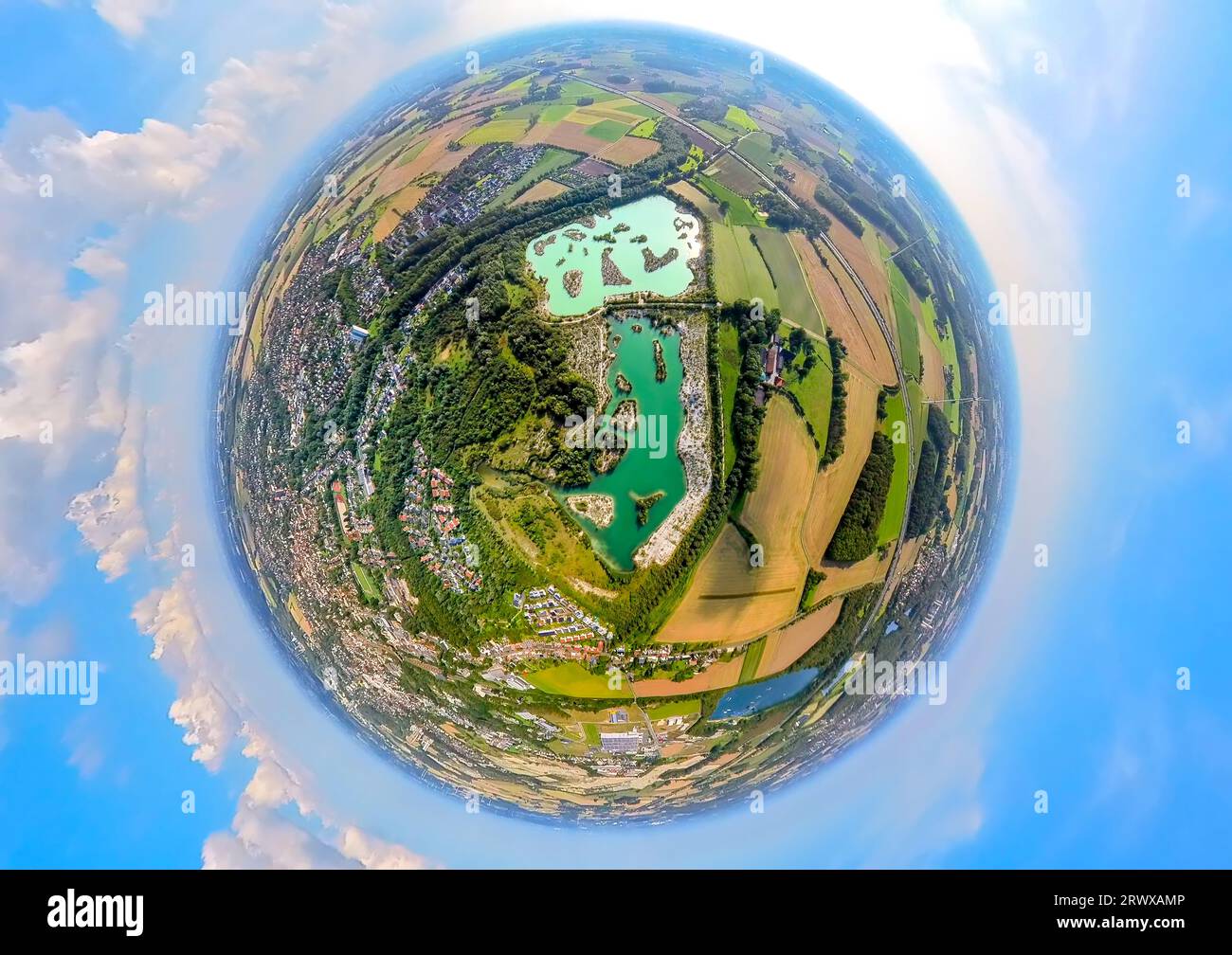 Aerial view, Blue Lagoon Dyckerhoffsee, nature reserve and turquoise water, WerseRadweg, globe, fisheye shot, 360 degree shot, tiny world, Beckum, Mün Stock Photo