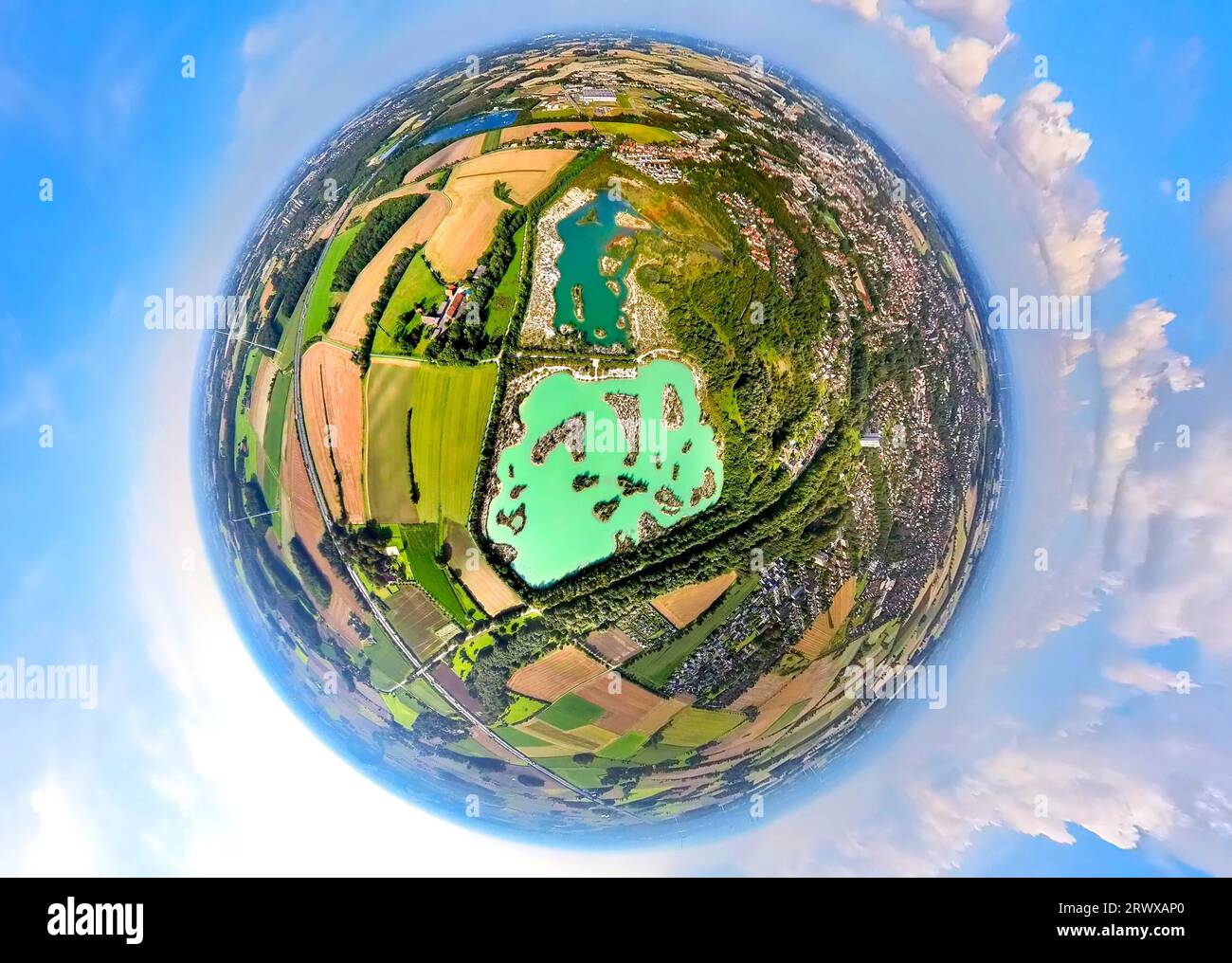 Aerial view, Blue Lagoon Dyckerhoffsee, nature reserve and turquoise water, WerseRadweg, globe, fisheye shot, 360 degree shot, tiny world, Beckum, Mün Stock Photo