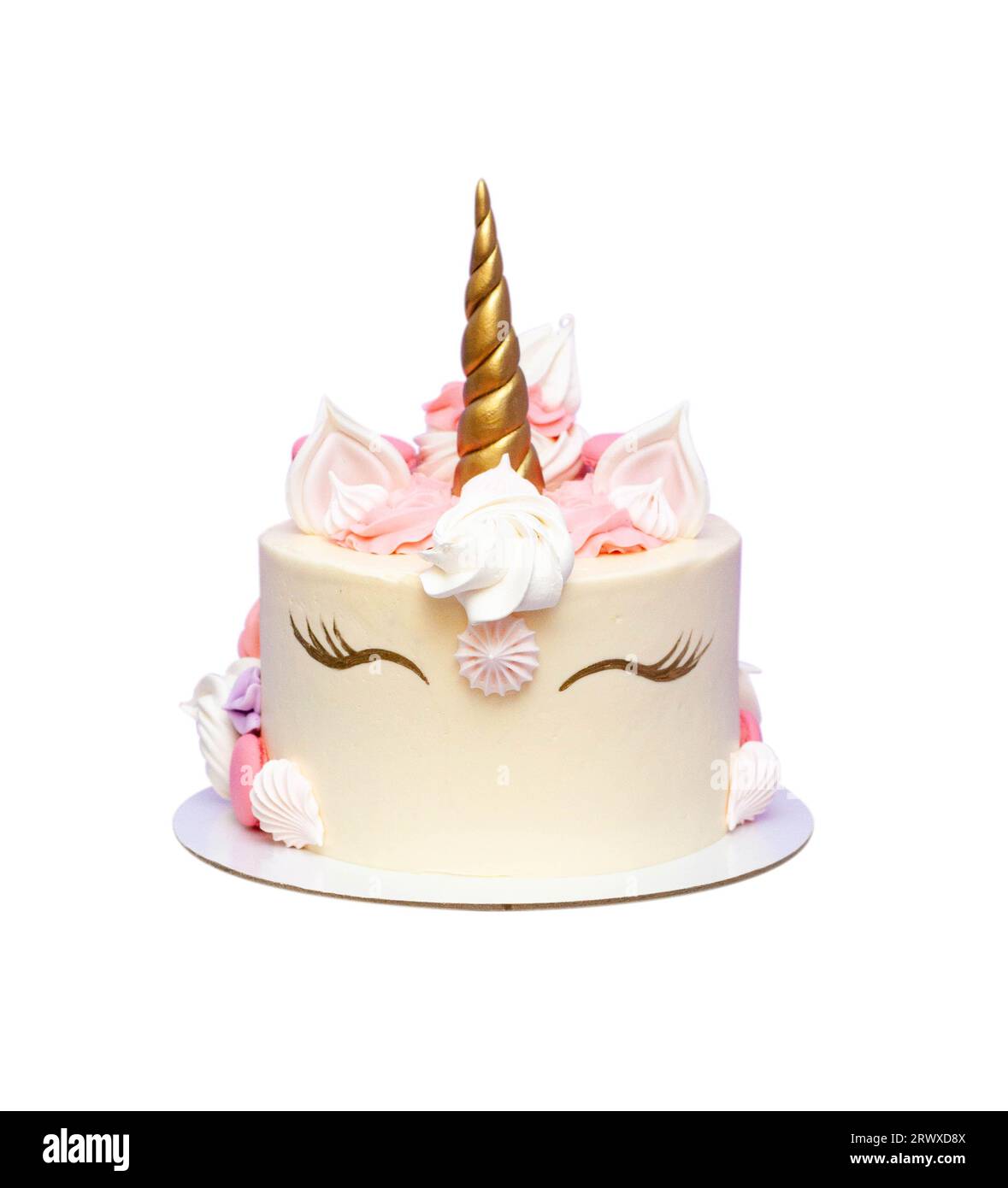 Cute unicorn cake with golden painted closed eyes, meringue ...