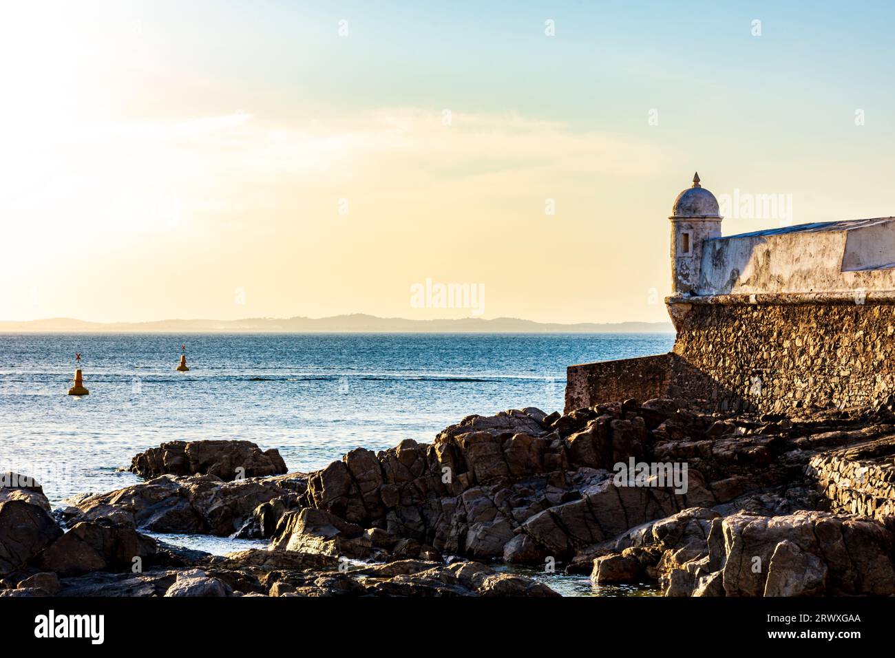 Saint Mary fort on the seafront of the city of Salvador in Bahia during sunset Stock Photo
