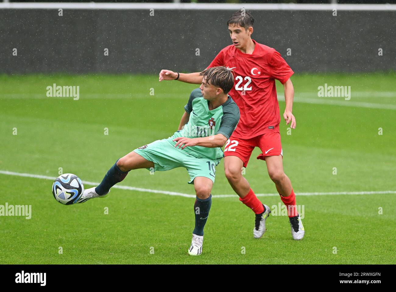 Oostakker, Belgium. 21st Sep, 2023. Joao Abreu (10) of Portugal and Yigit Evin (22) of Turkey pictured during a friendly soccer game between the national under 16 teams of Turkey and Portugal on Thursday 21 September 2023 in Oostakker, Belgium . Credit: sportpix/Alamy Live News Stock Photo