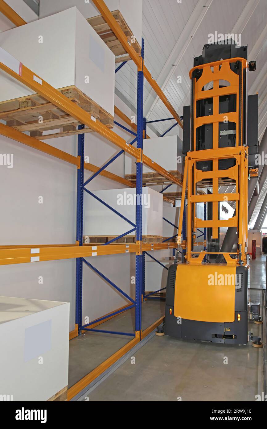 High Rack Stacker Forklift at Asle in Distribution Warehouse Stock Photo Alamy