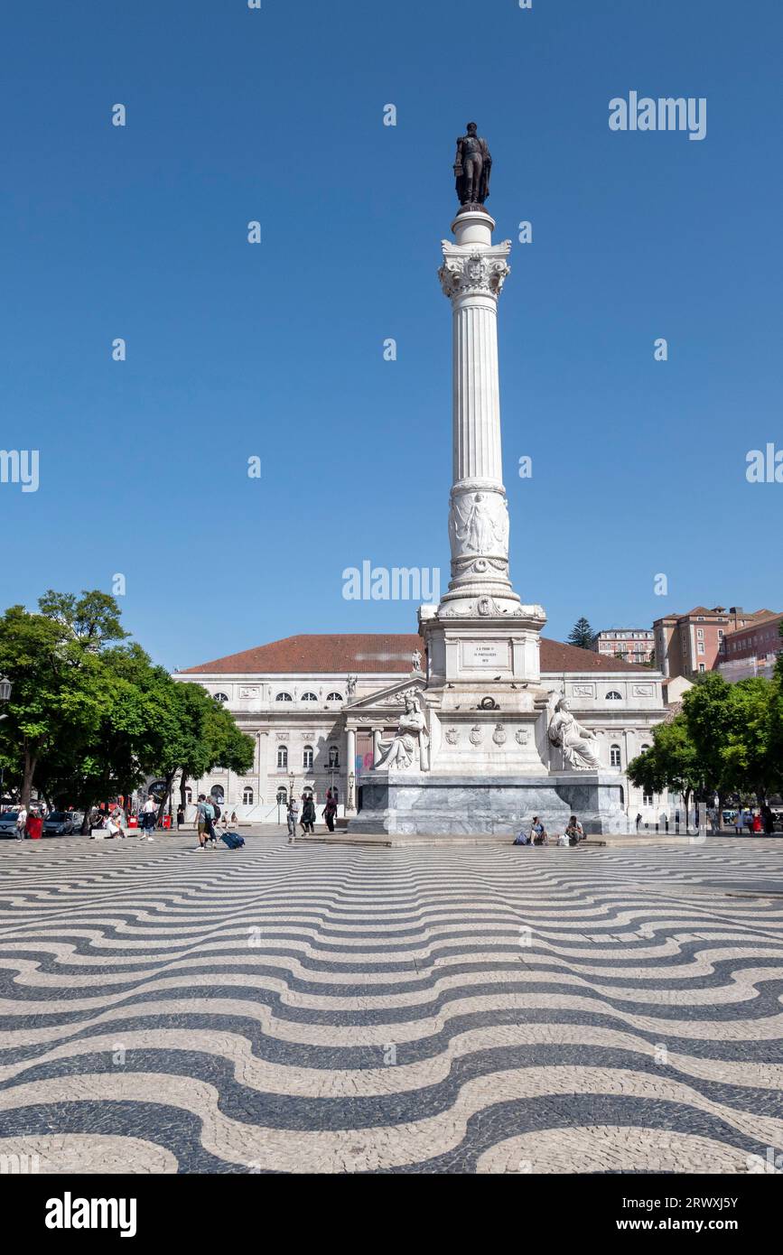 Column of Pedro IV with Queen Maria II National Theatre in background, Rossio Square, Lisbon, Portugal Stock Photo