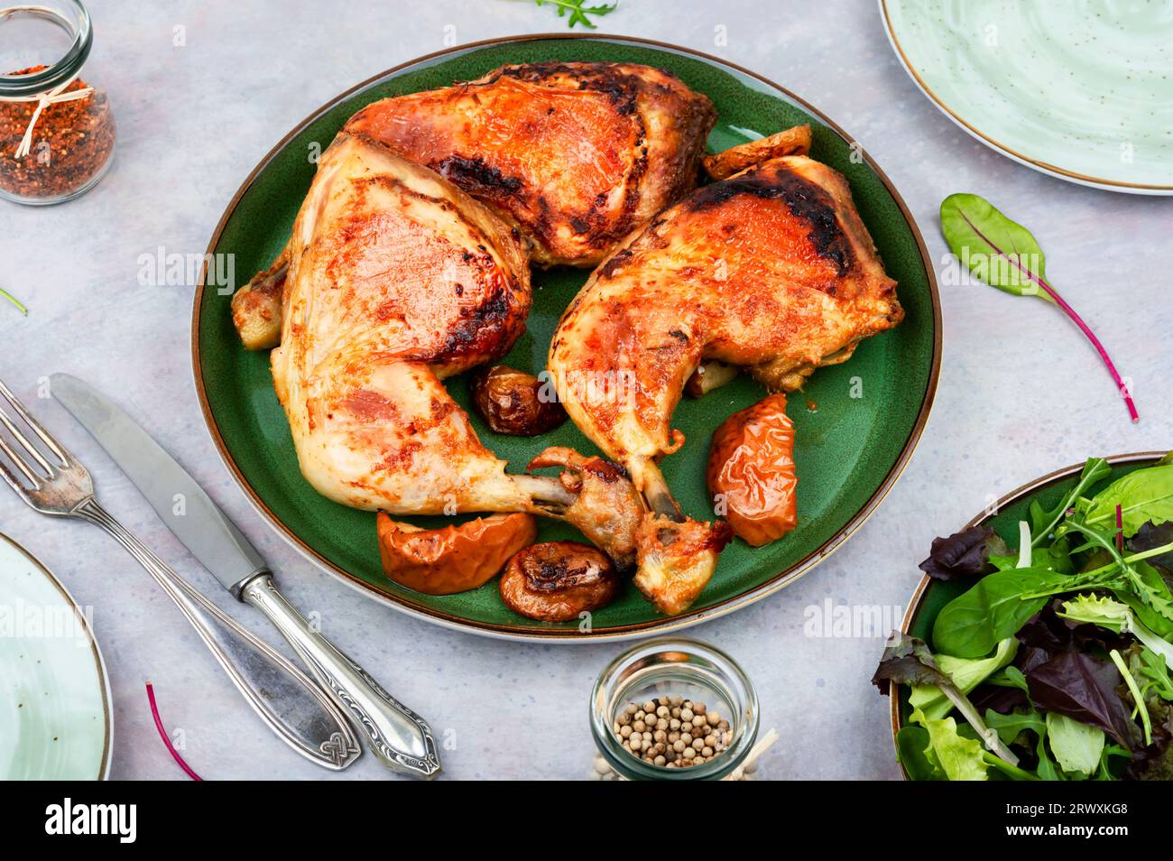 Spicy barbecue chicken legs. Fried chicken legs quarters Stock Photo