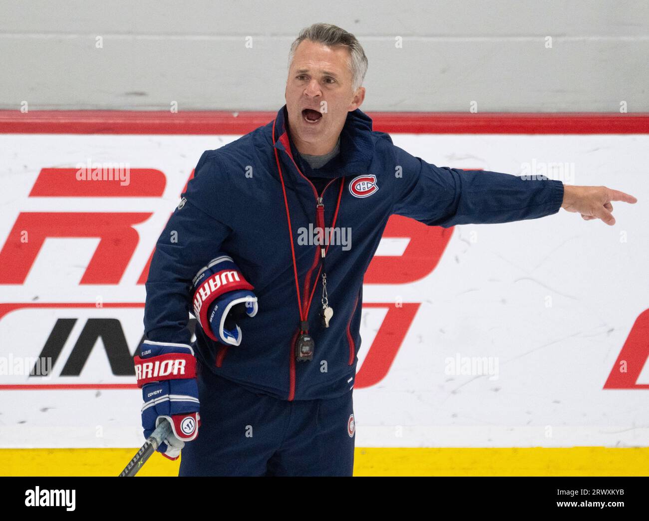 Montreal Canadiens head coach Martin St. Louis explains a drill during