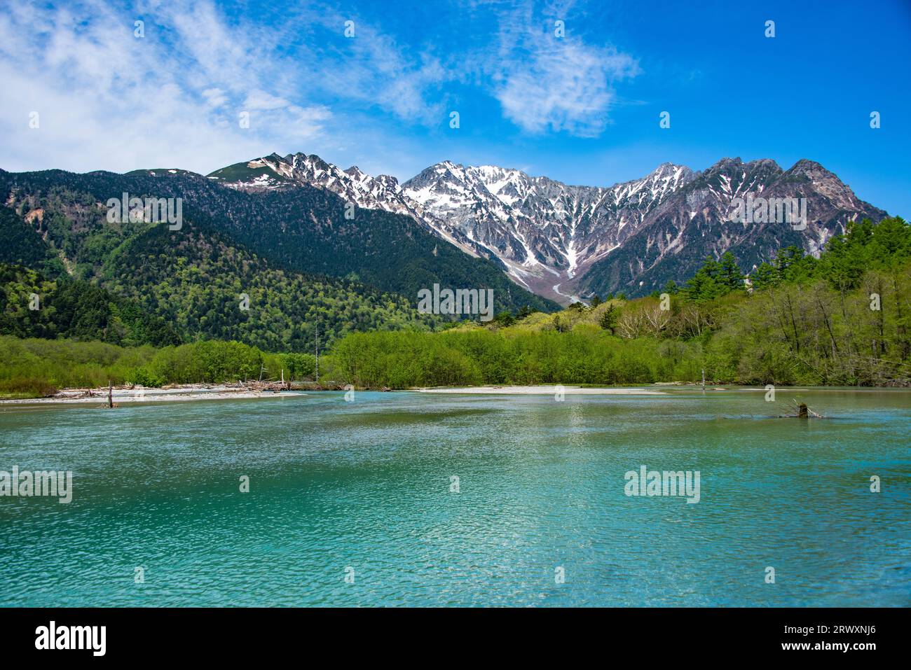 Kamikochi Hotaka mountain peaks and Taisho Pond Stock Photo Alamy