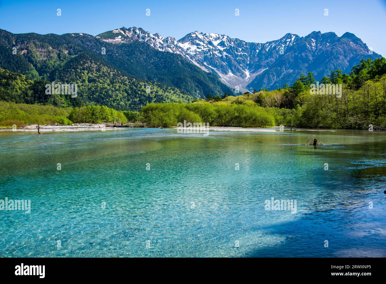 Kamikochi Hotaka mountain peaks and Taisho Pond Stock Photo Alamy