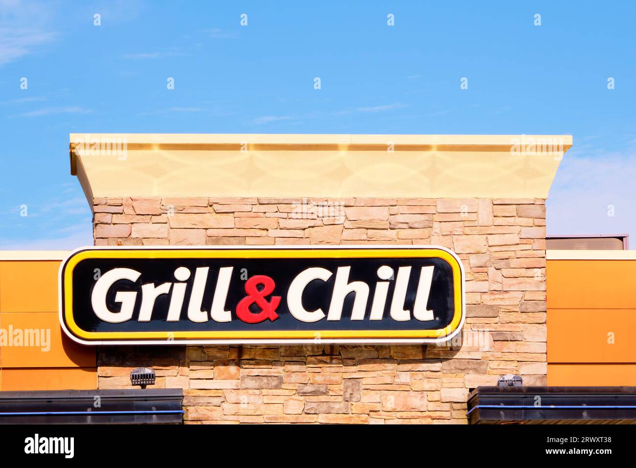 Dairy Queen Grill and Chill sign mounted on the restaurant Stock Photo