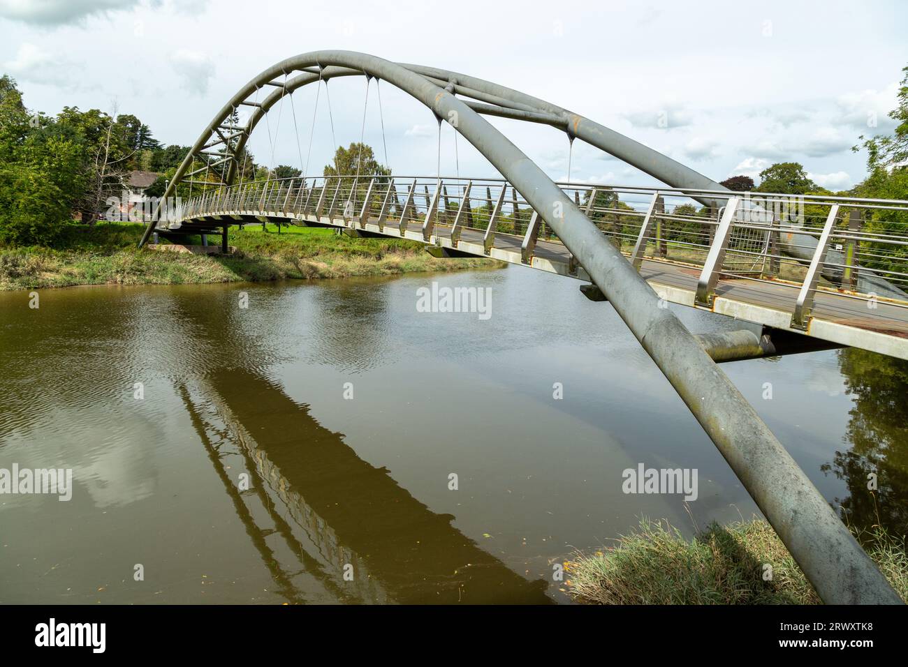 Kirkpatrick Macmillan Bridge  is a steel bowstring arch bridge over the River Nith, Dumfries Stock Photo
